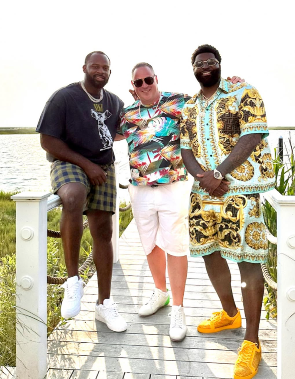 Sam DeMaio with former Philadelphia Eagles, Vinny Curry and Fletcher Cox