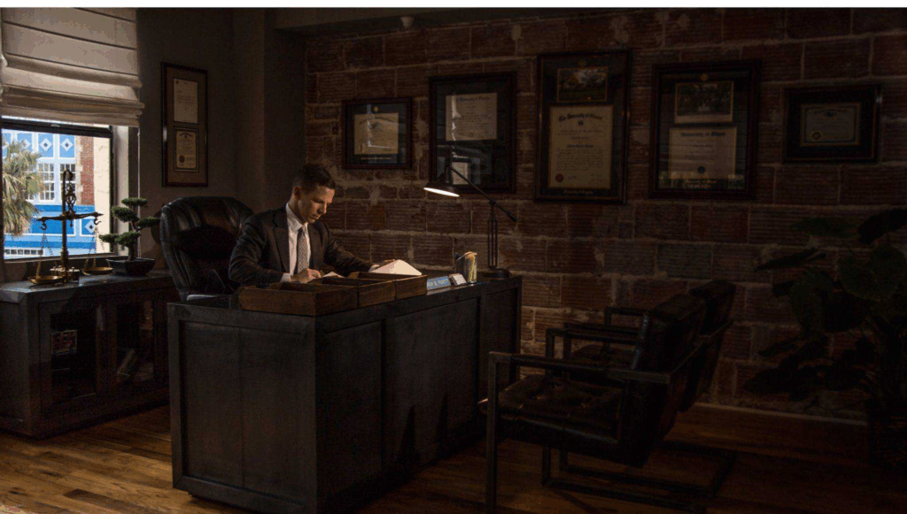Andrew in his office preparing for a case