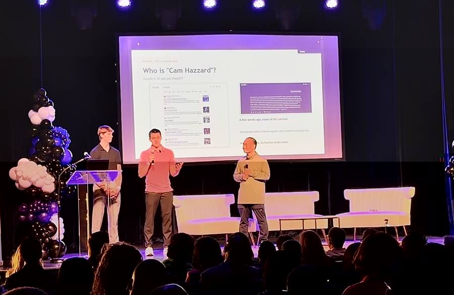 Dennis Yu on stage at the DSDT AI Summit in Detroit