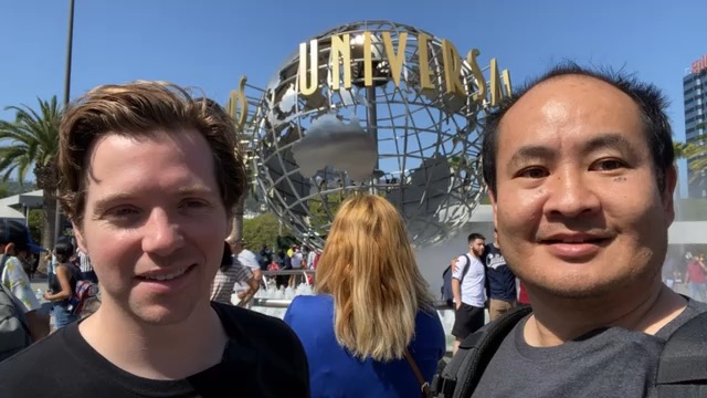Dennis Yu and Alex Berman in front of the Universal Studios Hollywood globe, 4 July 2021.