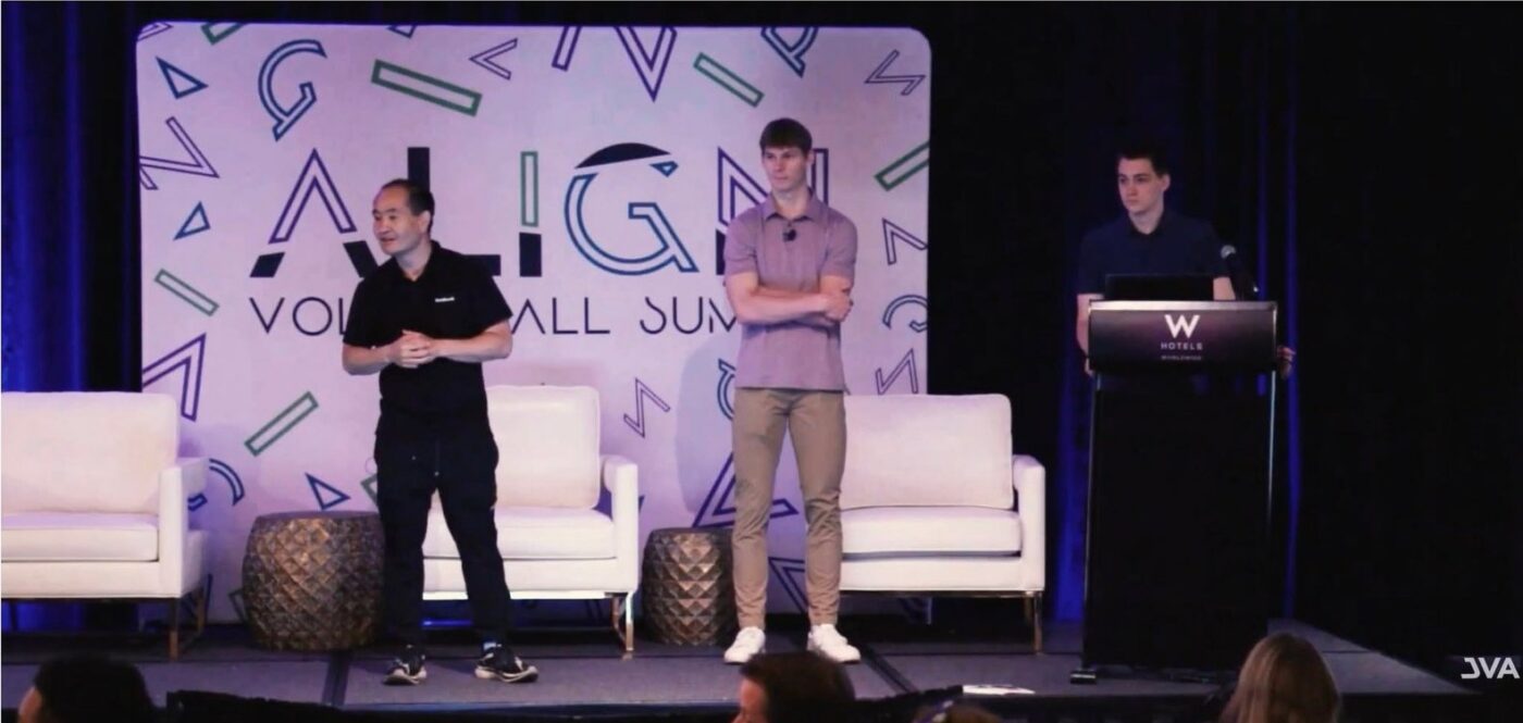 Dennis Yu with Cam Hazzard and Dylan Haugen on stage at the JVA Align Summit