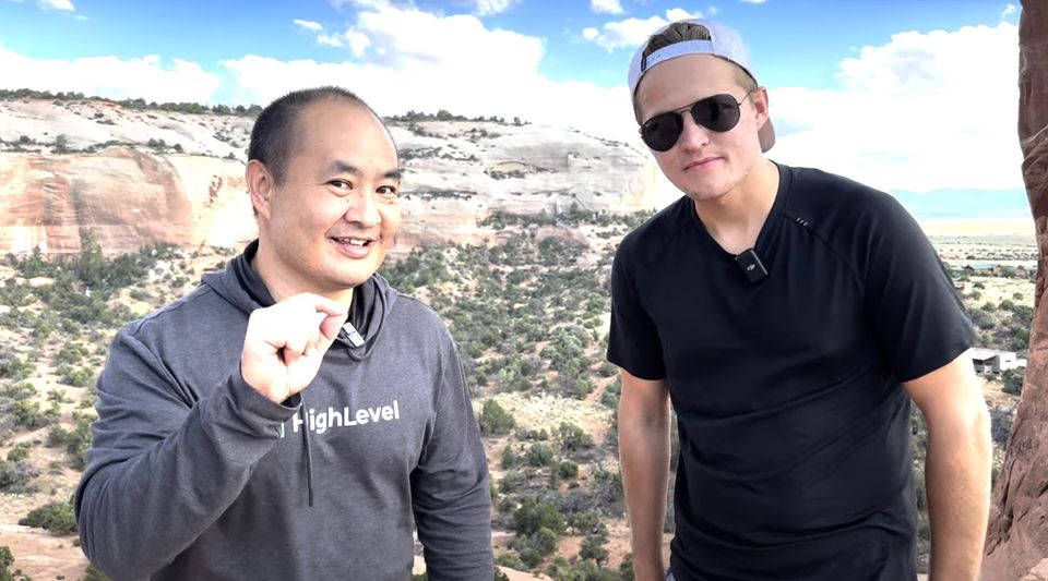 Dennis Yu and Marko Sipilä recording together outdoors, Marko wearing a lav mic