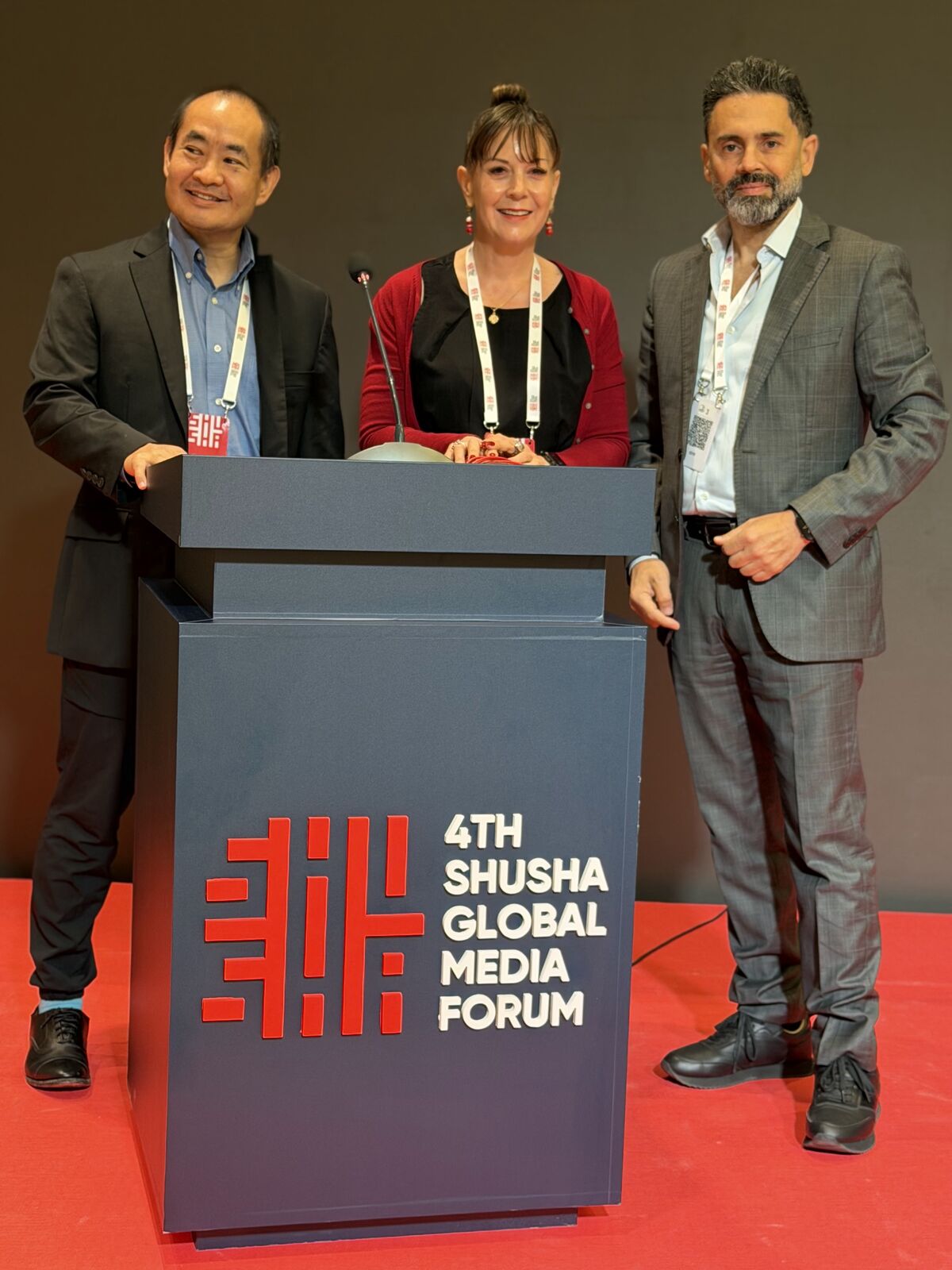 Dennis Yu at the Shusha Global Media Forum podium in Azerbaijan