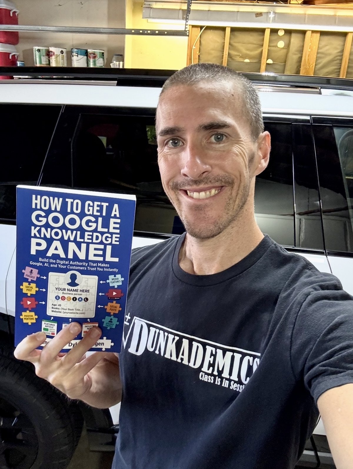 Billy Doran of Dunkademics holding How to Get a Google Knowledge Panel